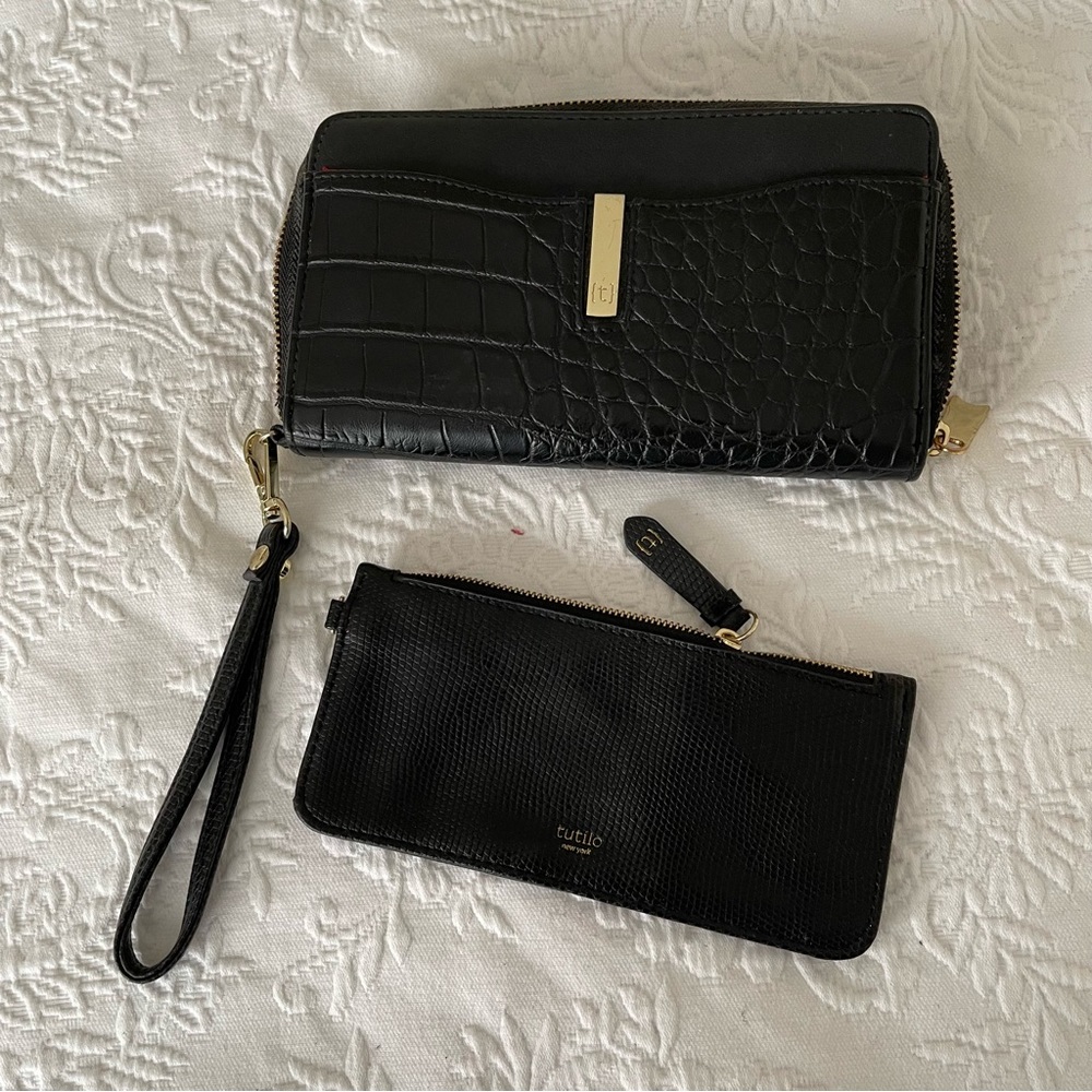NWOT Tutilo Black wallet with wristlet. Gold hardware. Very nice